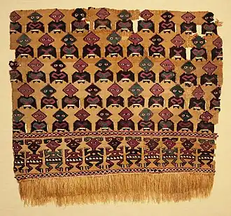 Fragment ofslit tapestry with eccentric weave and applied fringe, 1000–1470, camelid fiber and cotton, 163⁄4 x 18 in., Los Angeles County Museum of Art