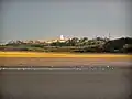 The Ashton Memorial in Williamson Park, Lancaster can be seen from the M6 motorway, Black Combe in the Lake District and from many miles out in the Irish Sea on days of good visibility.