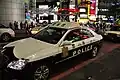 Toyota Crown with a raised lightbar in Shibuya
