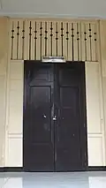 Double slab doors at the main building