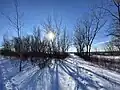 View of the setting sun from the Leslie Spit in winter