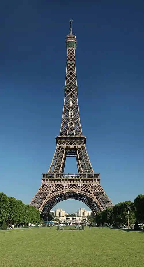 Image 18 Eiffel Tower Photo: Benh Lieu Song The Eiffel Tower as seen from the Champ de Mars. At 324 metres (1,063&nbsp;ft) tall, the tower, an iron lattice tower, is the tallest building in Paris, the most-visited paid monument in the world, as well as one of the most recognizable structures in the world. Named after its designer, Gustave Eiffel, it was built as an entrance arch for the 1889 Exposition Universelle and has since become the most prominent symbol of both Paris and France. More selected pictures