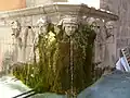Corner wall fountain on the church in Tourves (Var), dated 1792.