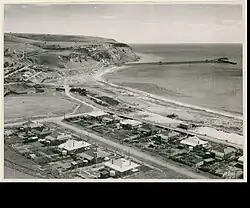 Image 2Rapid Bay, South Australia in 1950 with its limestone quarry and jetty for loading limestone onto ships (from Transport in South Australia)