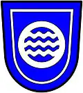 a tressure—Azure, an annulet, therewithin three barrulets wavy, conjoined, all within a tressure, argent—Umgeni Water Board, RSA