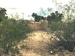The adobe ruins of one of two soldier barracks