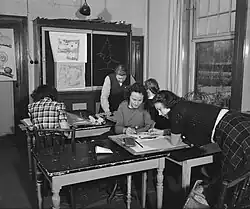 Lessons in a classroom, April 1946