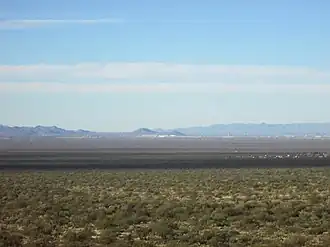 "A" Mountain (right) and Tumamoc Hill (left) in the distance, looking west across the Tucson Valley