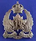 NCO's cap badge from the 2nd issue (with motto) c. 1920