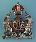 Officer's cap badge for the peaked service dress hat from the 2nd issue (with motto) c. 1920