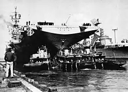 Ticonderoga alongside Northampton at Norfolk, Virginia in 1957.