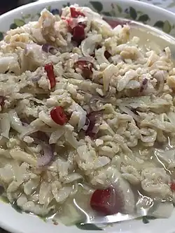 Umai, a dish of sliced raw fish with a mixture of onions, chillies, salt and lime juice.[23]