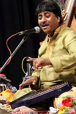 Rashid Khan playing swarmandal