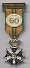 Cross in gold, 60th year. From 2007