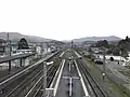 A high-angle view from the footbridge, looking west.