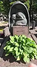 His grave, with a crying angel sculpted by Viivi