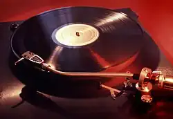 Image 9An LP record on a phonograph (from Album era)