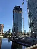 Tower 1 under construction in April 2025