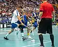 Mika Kohonen (left) in the final match against Sweden at the 2018 World Floorball Championships.