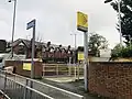 West Didsbury Metrolink stop, on the opposite side of Palatine Road