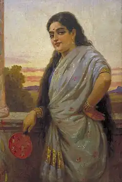 Woman holding a fan