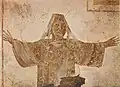 Woman praying as orans