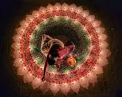 Lighting candles for the Indian festival of Diwali