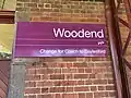 Woodend station signage at Platform 1, July 2022
