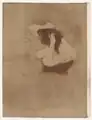 Woman Combing Her Hair